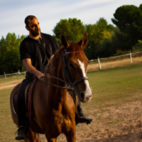 a man riding a horse